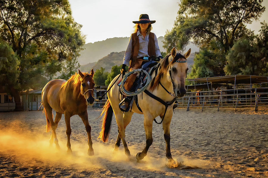 Cowgirl At Sunset Photograph by Jerry Cowart