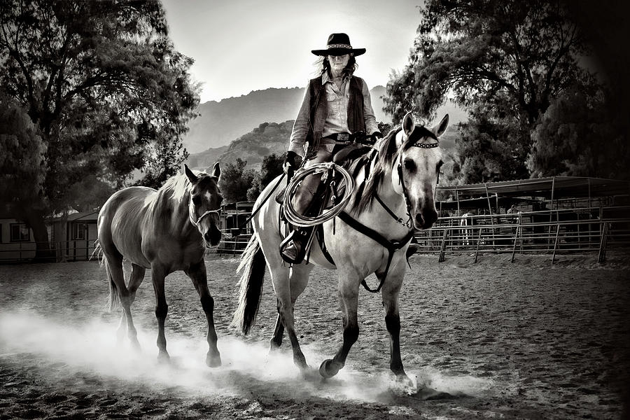 Cowgirl Ponying Photograph by Jerry Cowart