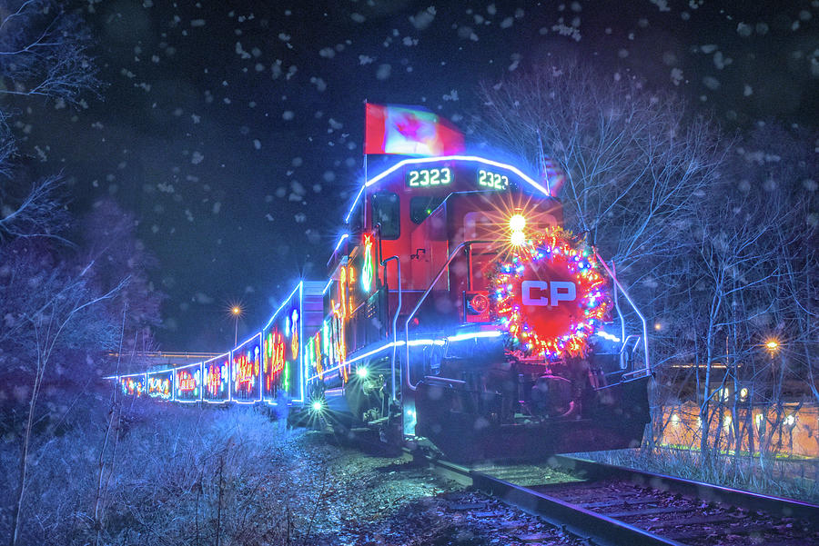 CP Holiday Train in snow Photograph by Joy McAdams