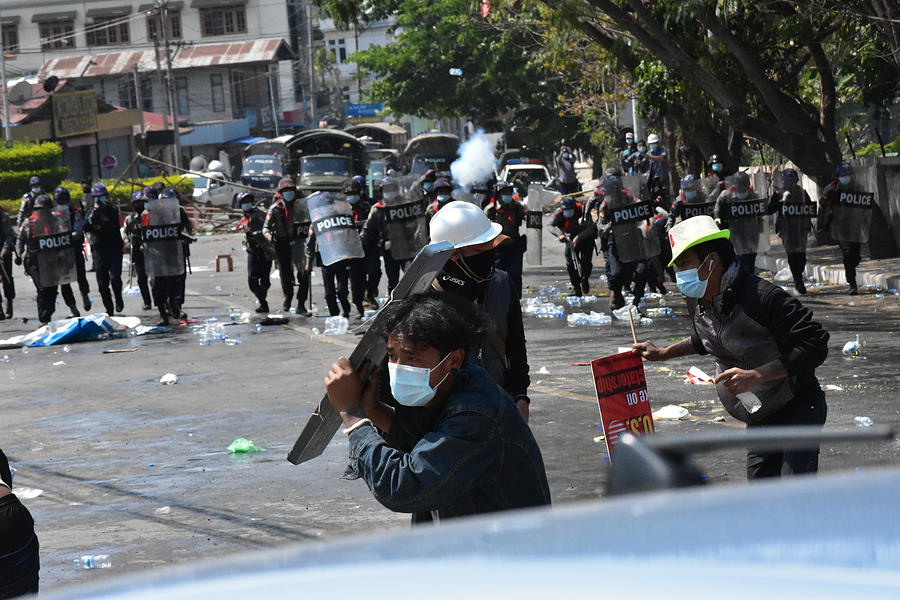 Crackdown on peaceful protesters in Myanmar Photograph by Robert Bociaga