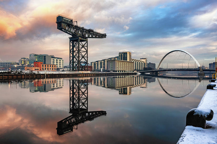Crane and bridge reflection  Photograph by Grant Glendinning