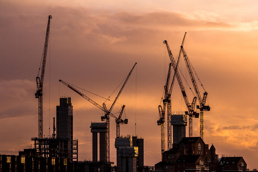 Cranes and construction equipment on London city skyline Photograph by Coldsnowstorm