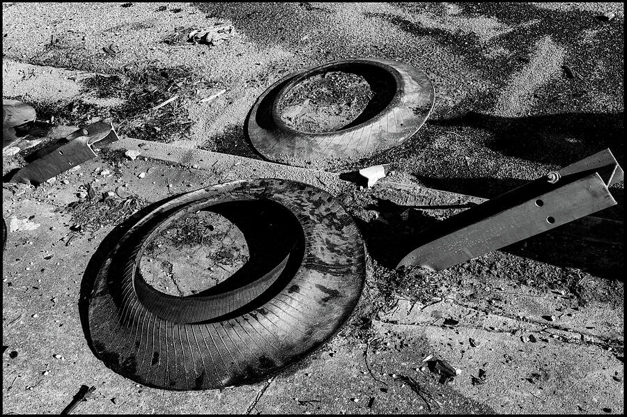 Discarded Tires on Pavement Photograph - Crash Squared by Jeremy Butler