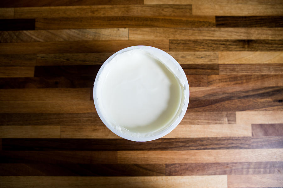 Creamy yogurt on wooden table Photograph by Photographer, Basak Gurbuz Derman