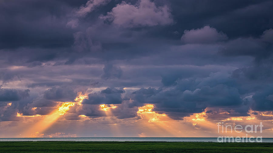 Crepuscular Rays over the Waddensea Photograph by Henk Meijer Photography