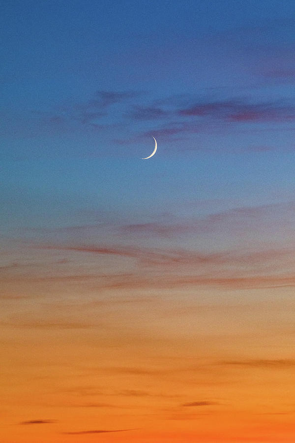 Cresent Moon at Sunset Photograph by Michael Russell