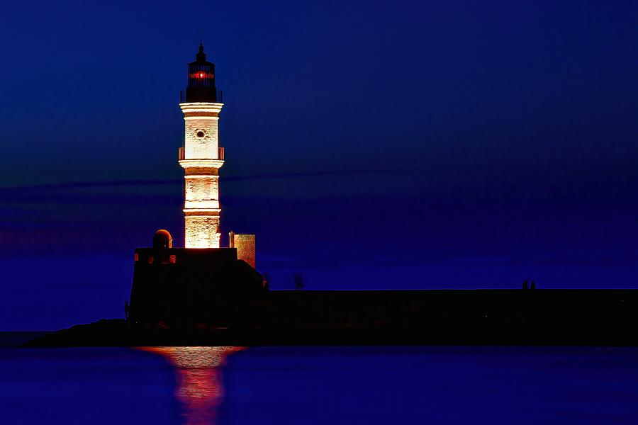 Crete lighthouse blue Photograph by John Babis