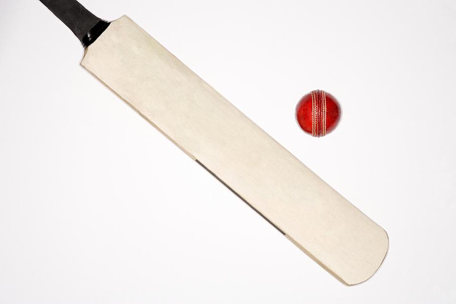 Cricket bat and ball Photograph by Image Source