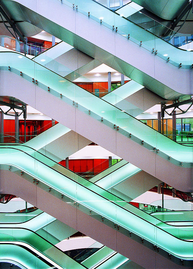 Criss-crossing escalators Photograph by Tony Weller