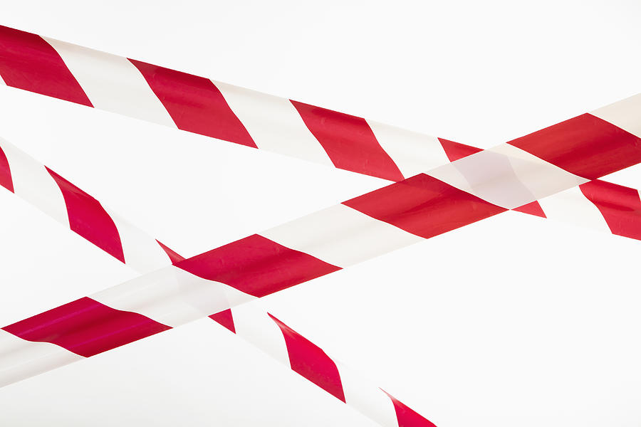 Crisscrossed red and white striped cordon tape  Photograph by Epoxydude