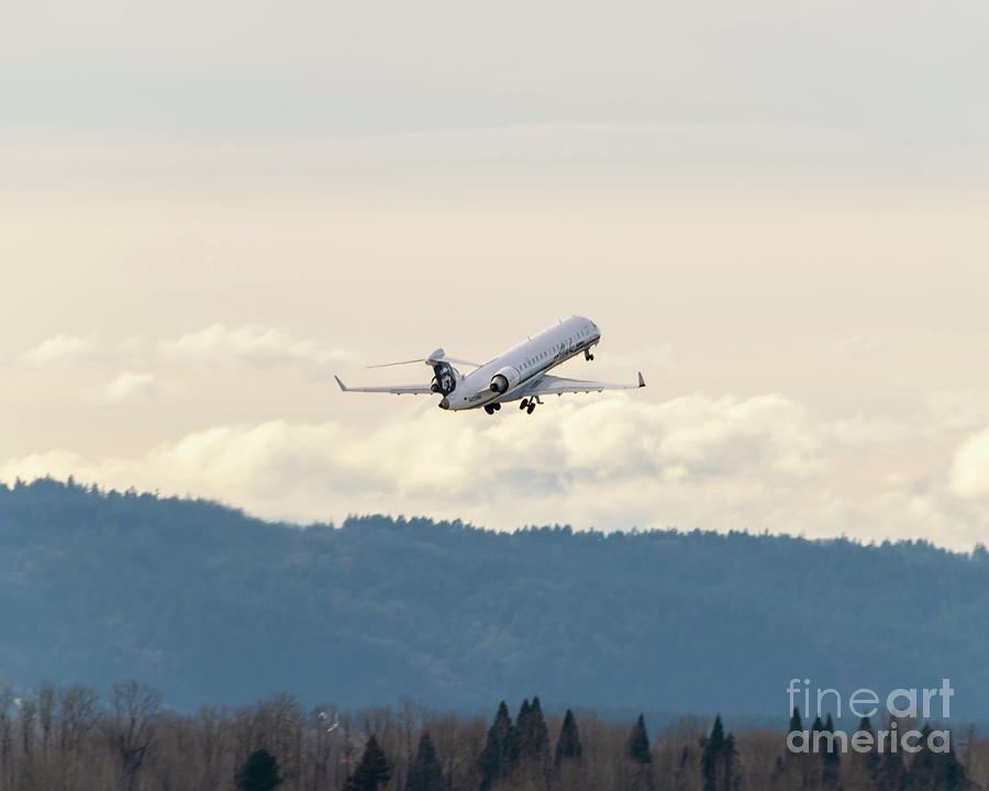 Crj-700 Retracting Gear And Rising Into The Oregon Sky Photograph