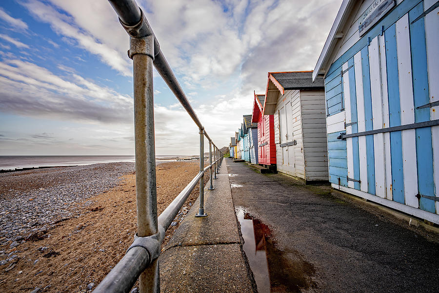 Cromer beach huts on the North Norfolk Coast Photograph by Chris Yaxley