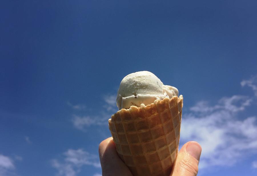 Cropped Hand Holding Ice Cream Cone Against Sky During Summer Photograph by Paulien Tabak / EyeEm Cropped Hand Holding Ice Cream Cone Against Sky During Summer Photograph by Paulien Tabak / EyeEm