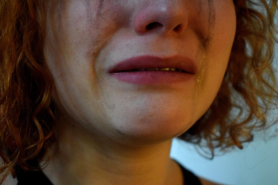Cropped Image Of Woman With Smudged Make-Up Crying Photograph by Beatrice Lorenzoni / EyeEm