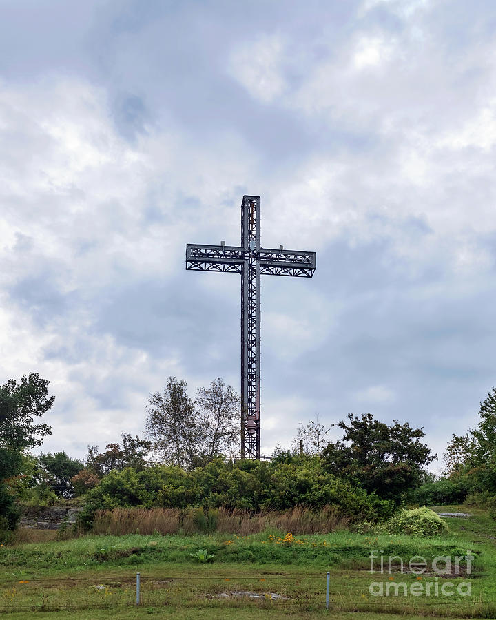 Cross on top of Mount Arthabaska, Victoriaville, Quebec, Canada. Photograph by Marek Poplawski