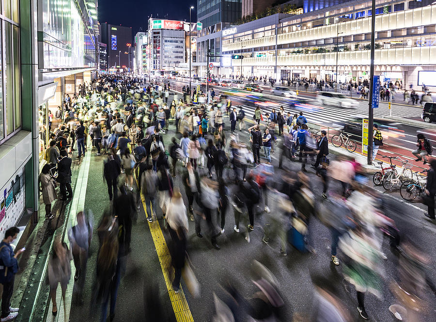 Crowd in front of the busy Shinjuku station in Tokyo Photograph by @ Didier Marti