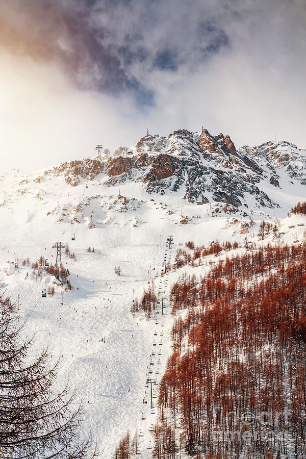 Crowd of people alpine skiing on french mountain ski slopes in Val dIsere Photograph by Gregory DUBUS