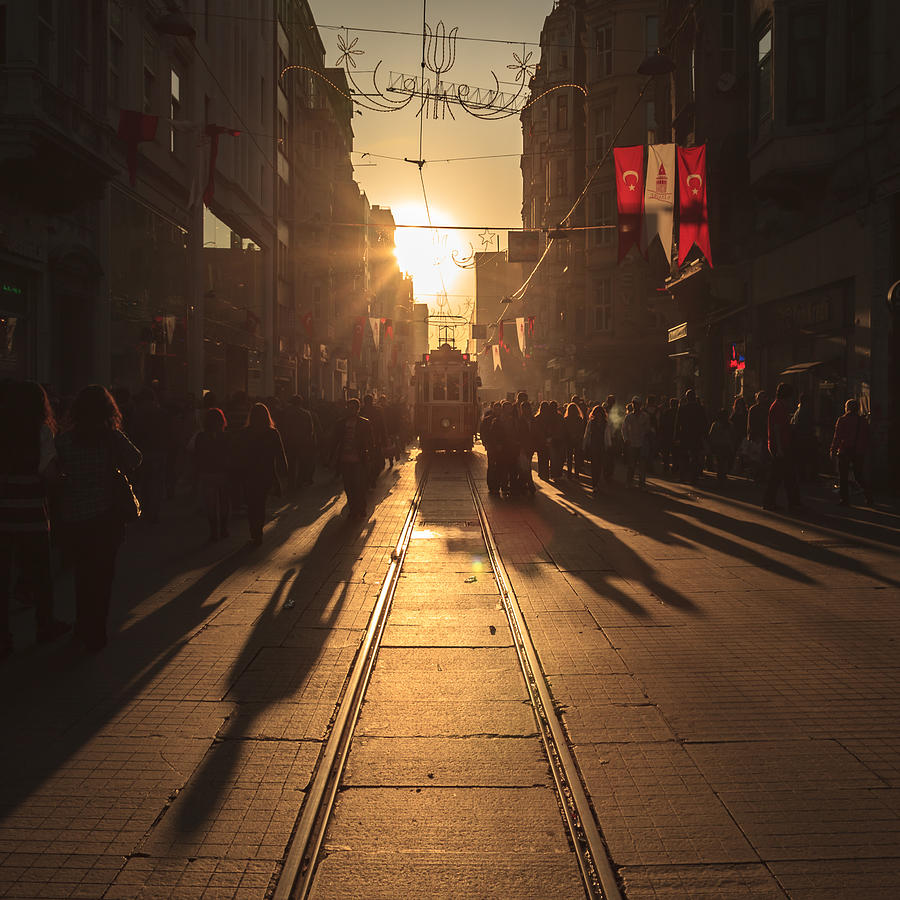 Crowds of shoppers and a tram on Istiklal Avenue in Istanbul, Turkey Photograph by Kelvinjay