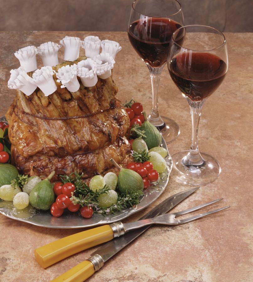 Crown roast with red wine Photograph by Jupiterimages