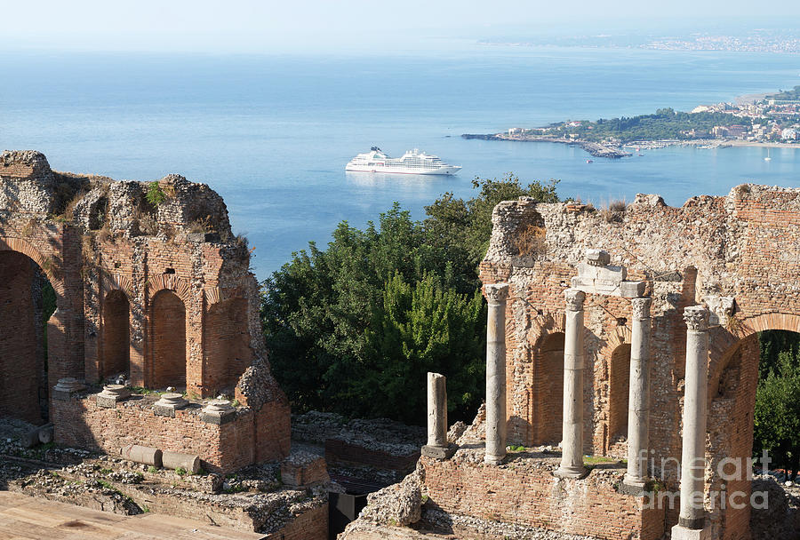Cruise ship beyond the ancient Greek theatre in Taormina Photograph by Bryan Attewell
