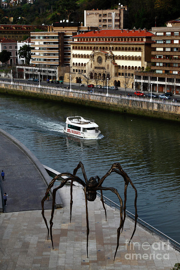 Cruising Past The Spider Bilbao Spain Photograph by James Brunker