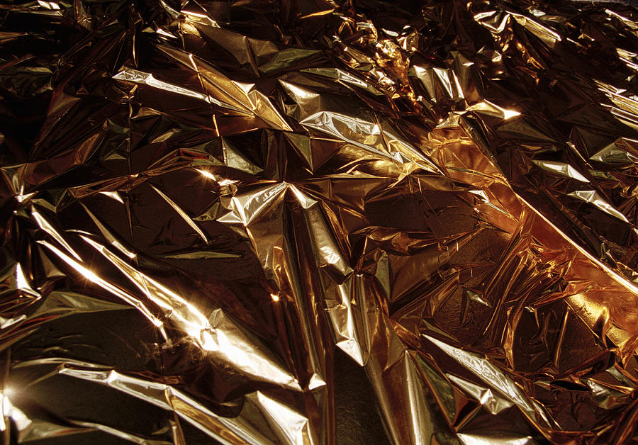 Crumpled gold foil Photograph by Martin Diebel