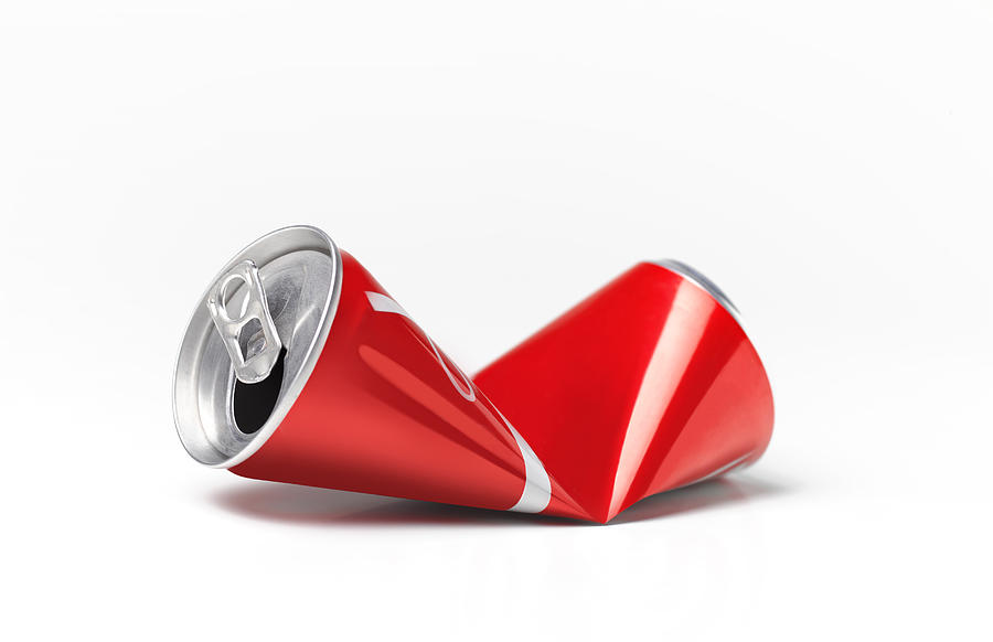 Crushed Soda Can For Recycling Photograph by Peter Dazeley