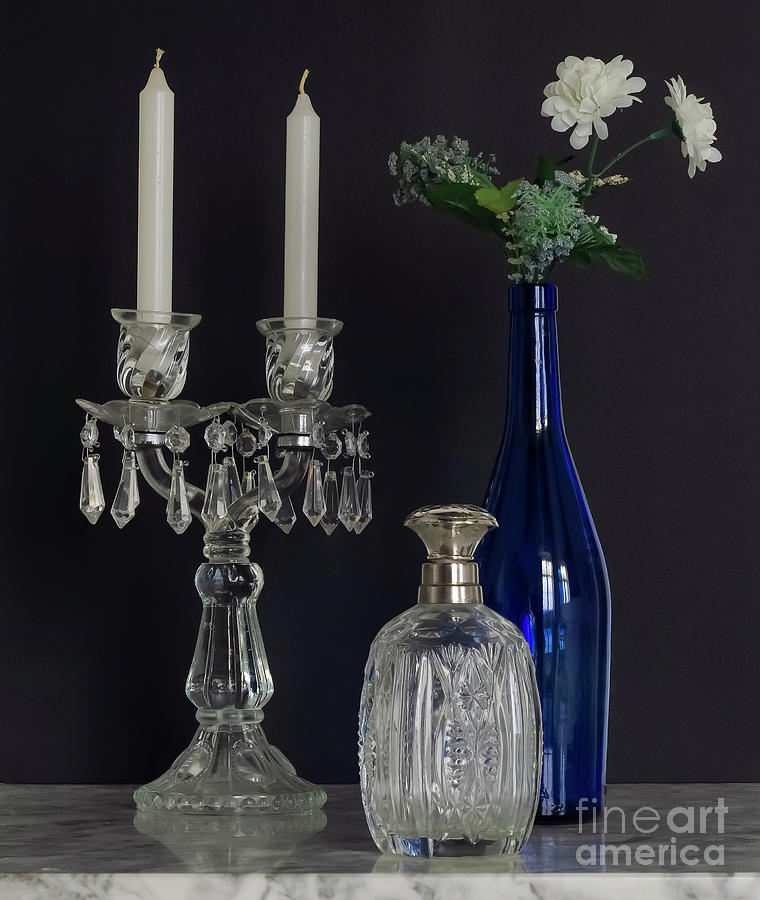 Crystal Table Chandelier with Blue glass Bottle and Flowers Still Photograph by Pablo Avanzini