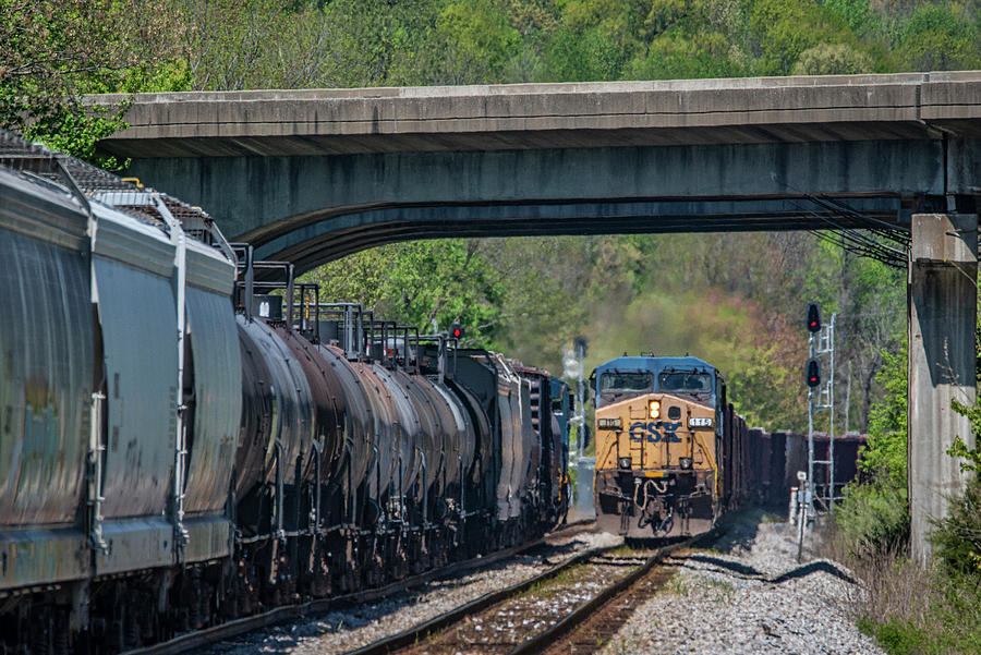 CSX empty ballast train W086 takes the siding at Oak Hill Photograph by Jim Pearson