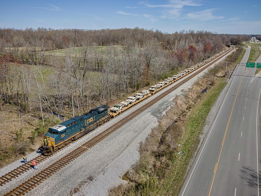 CSX W809 waits with its military load at Nortonville Ky Photograph by Jim Pearson