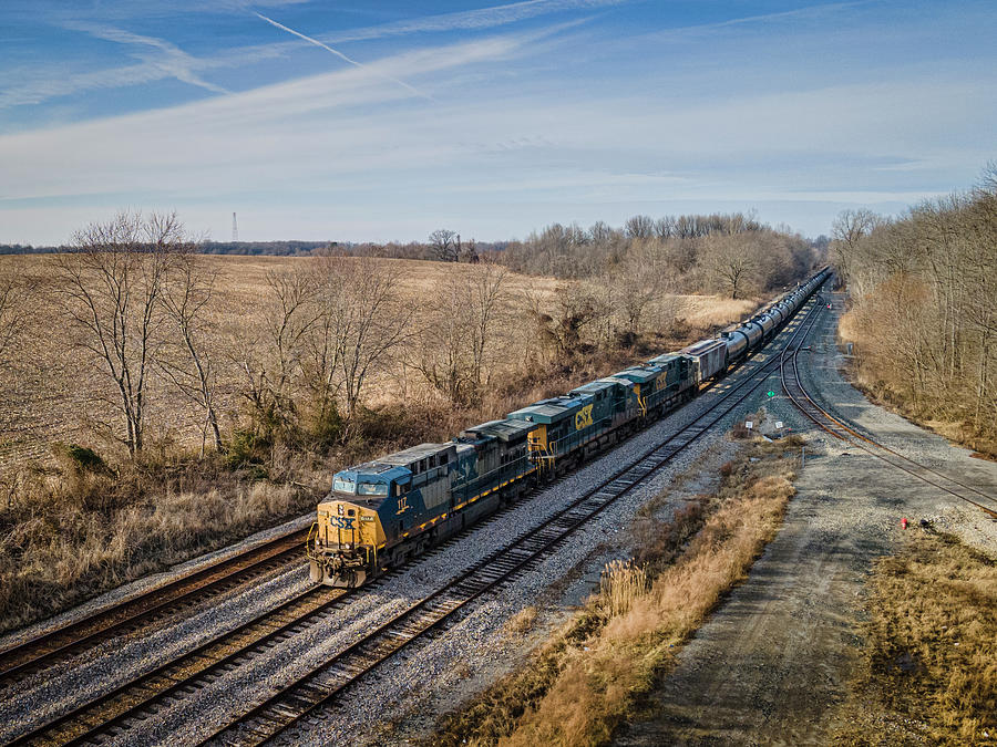 CSXT 117 in YN2 Paint leads K423-05 South on the Henderson Subdivision Photograph by Jim Pearson