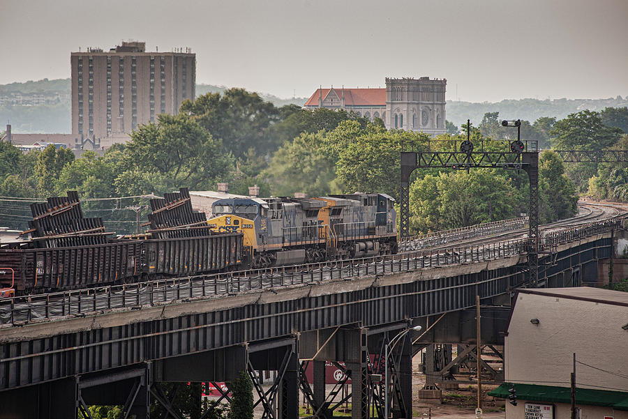 CSXT 154 and 395 lead a maintenance of way train Photograph by Jim Pearson