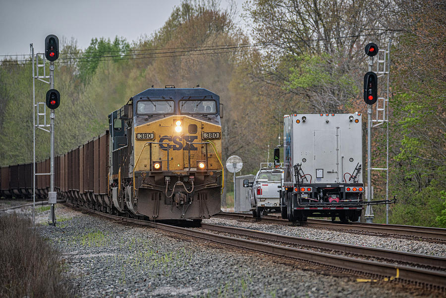 CSXT 380 leads empty coal train E013-13 Photograph by Jim Pearson