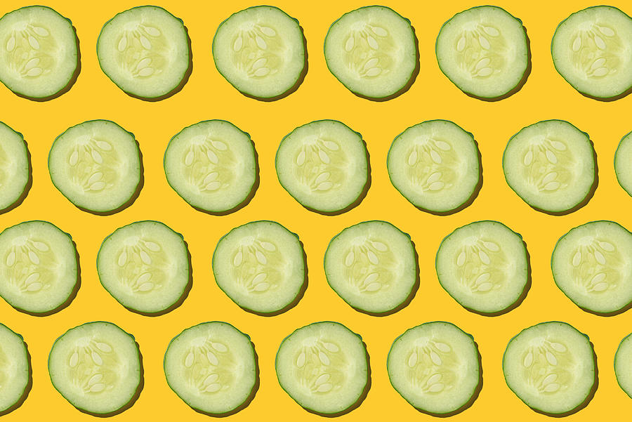 Pattern Digital Art - Cucumber regular pattern. Circles of green cucumber on a yellow background.  by Aleksandra Medvedeva