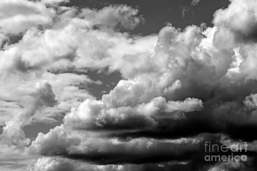 Cumulus Clouds With Vertical Growth In Black And White Photograph