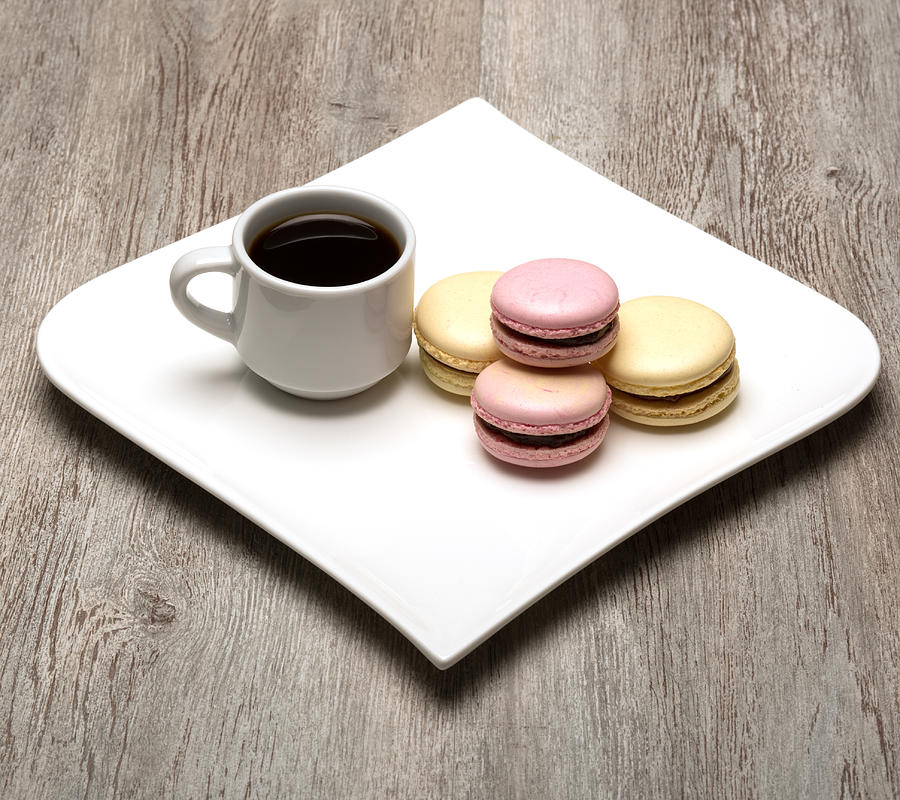 Cup of coffee and french macaron Photograph by Jean-Marc PAYET