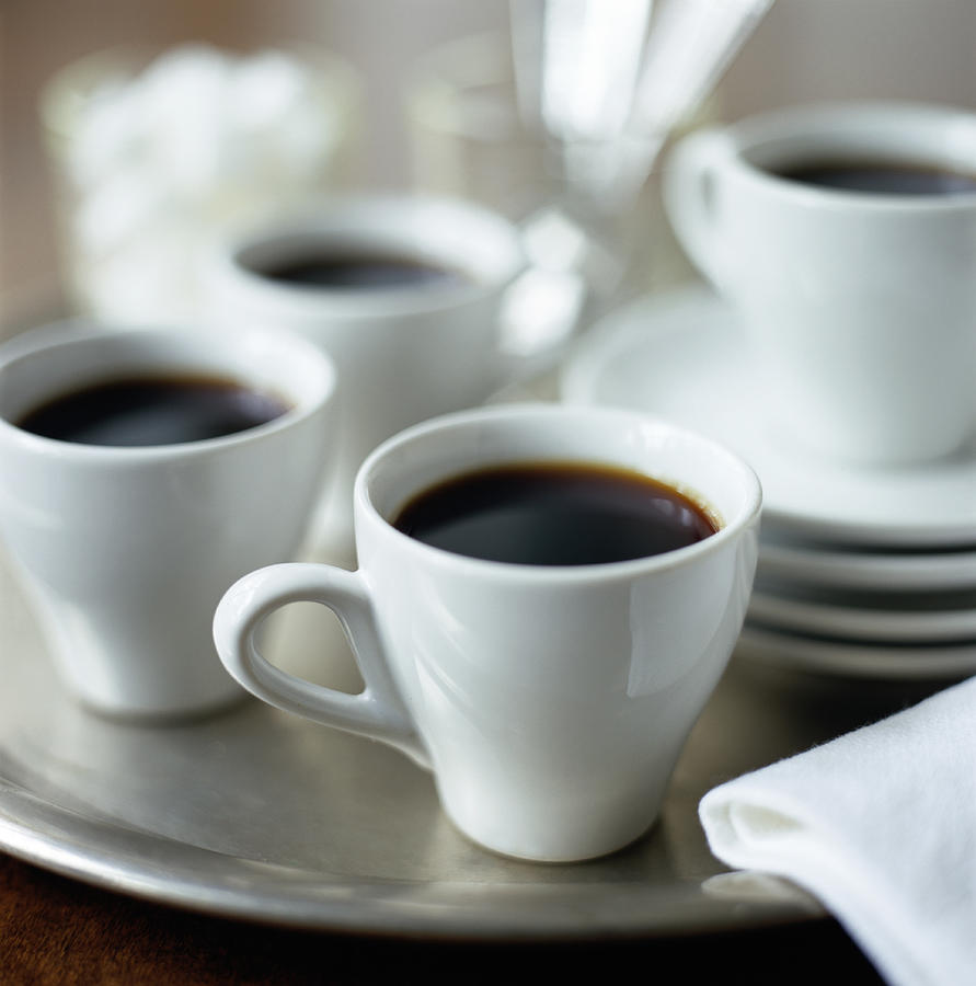 Cups of Espresso on silver tray Photograph by Anthony-Masterson