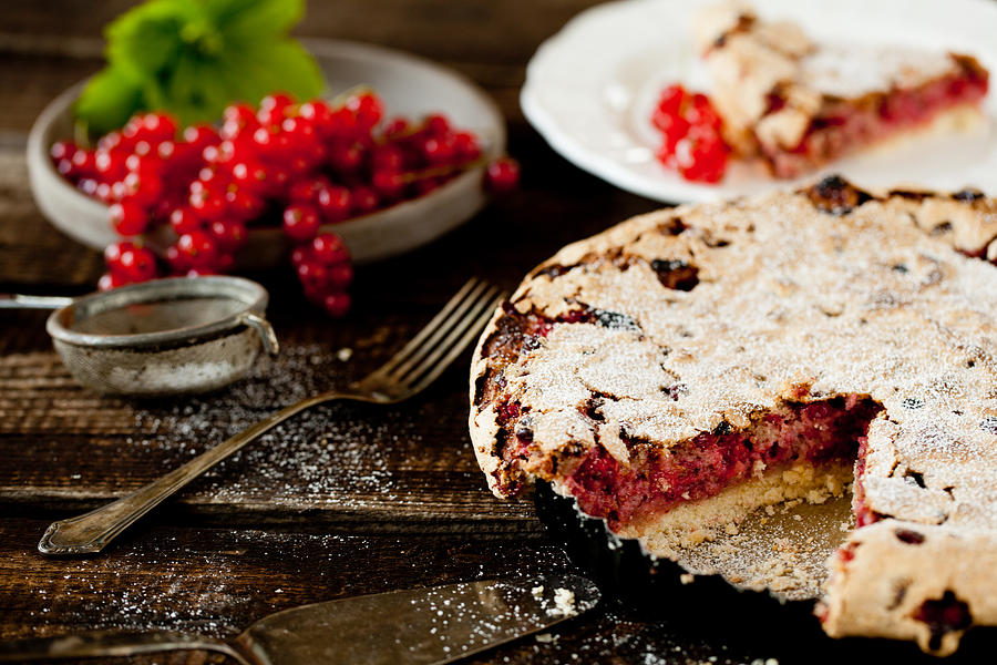 Currant cake on wooden ground Photograph by Carolafink