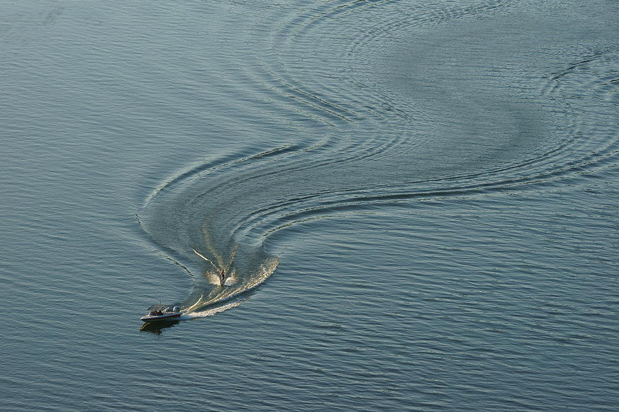 Curve trail of waterskiing Photograph by Penboy