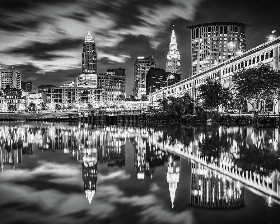 Cuyahoga River Skyline Reflections Of Downtown Cleveland - Black and White Photograph by Gregory Ballos