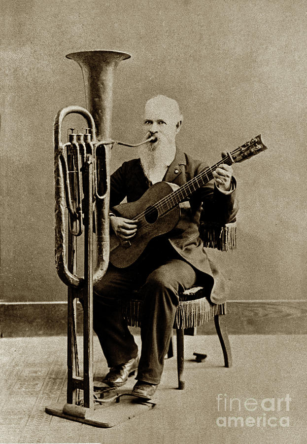 Guitar Still Life Photograph - C.W.J. Johnsin with a guitar and a Tuba-like musical instrument 1895 by Monterey County Historical Society