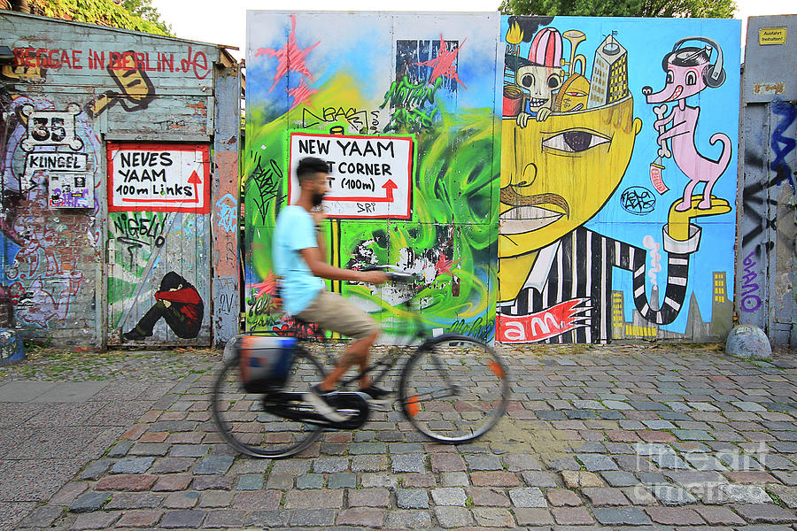 Berlin Photograph - Cycling in Berlin by Iryna Liveoak