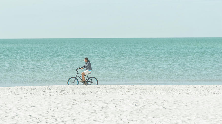 Cycling the Beach Photograph by CR Courson