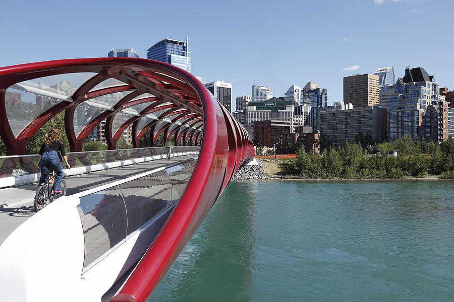 Cycling The Peace Bridge To Corporate Calgary Photograph by Constantgardener
