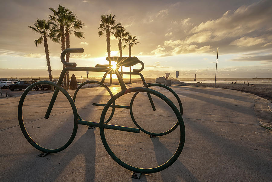 Cycling Towards A Sunset Photograph by Joseph S Giacalone