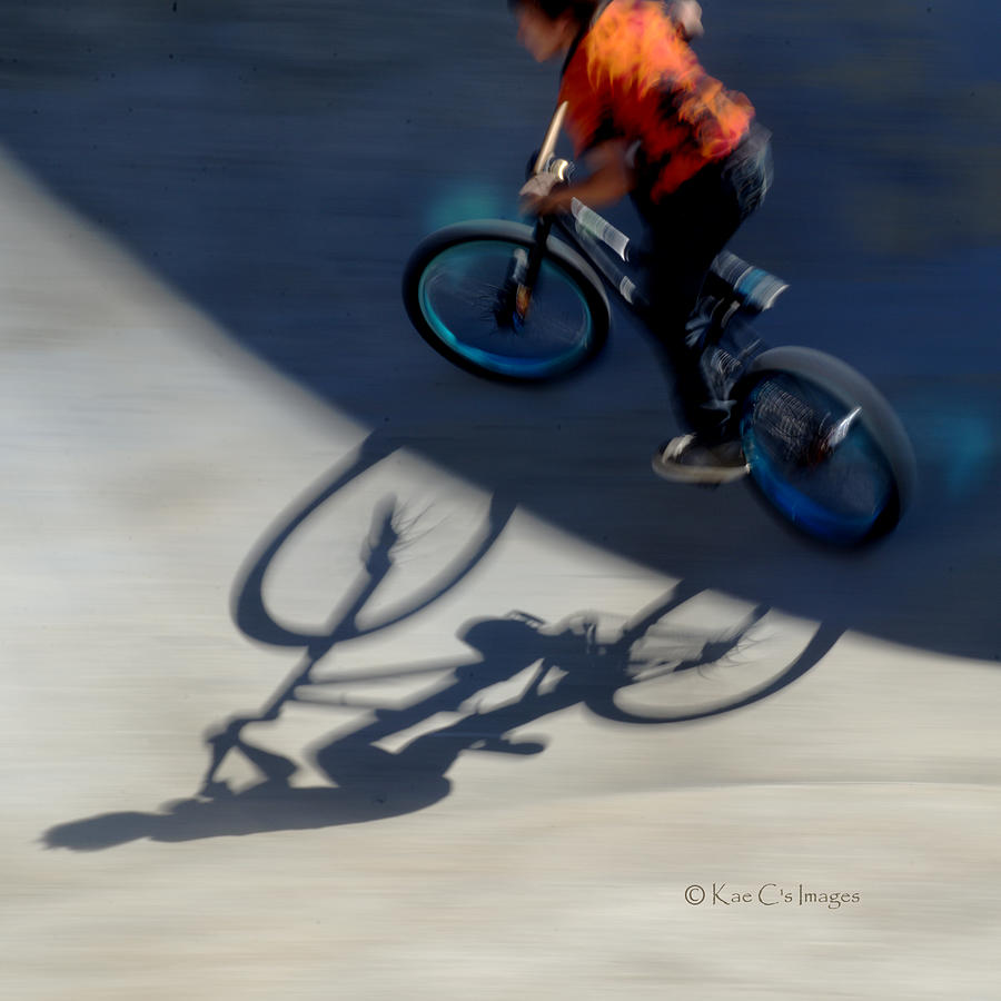 Cyclist and His Shadow Photograph by Kae Cheatham