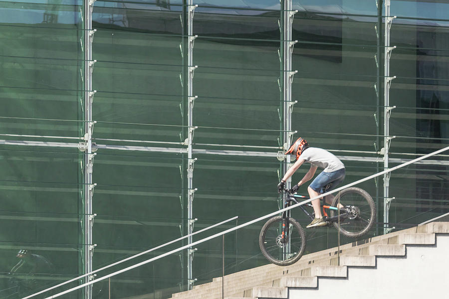 Cyclist On The Steps Photograph