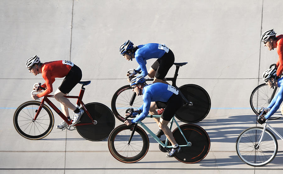 Cyclists racing, side view Photograph by Ryan McVay