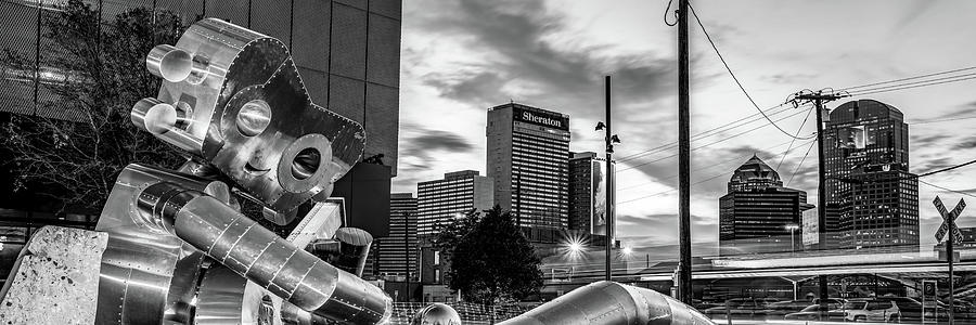 Dallas Skyline and Traveling Man Waiting on A Train Panorama - Black and White Photograph by Gregory Ballos