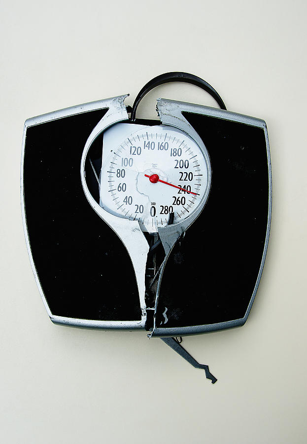Damaged Weight Scale Photograph by PM Images